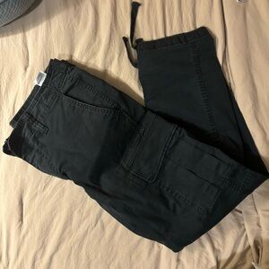 Size 33x30 (men) about a size 14 to women bottoms. Bottom strings to tighten